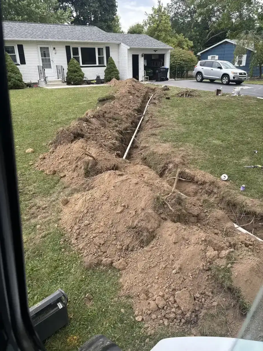 Trench dug for installation of a new waste line