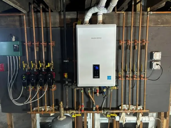 Installed combination boiler with connected piping