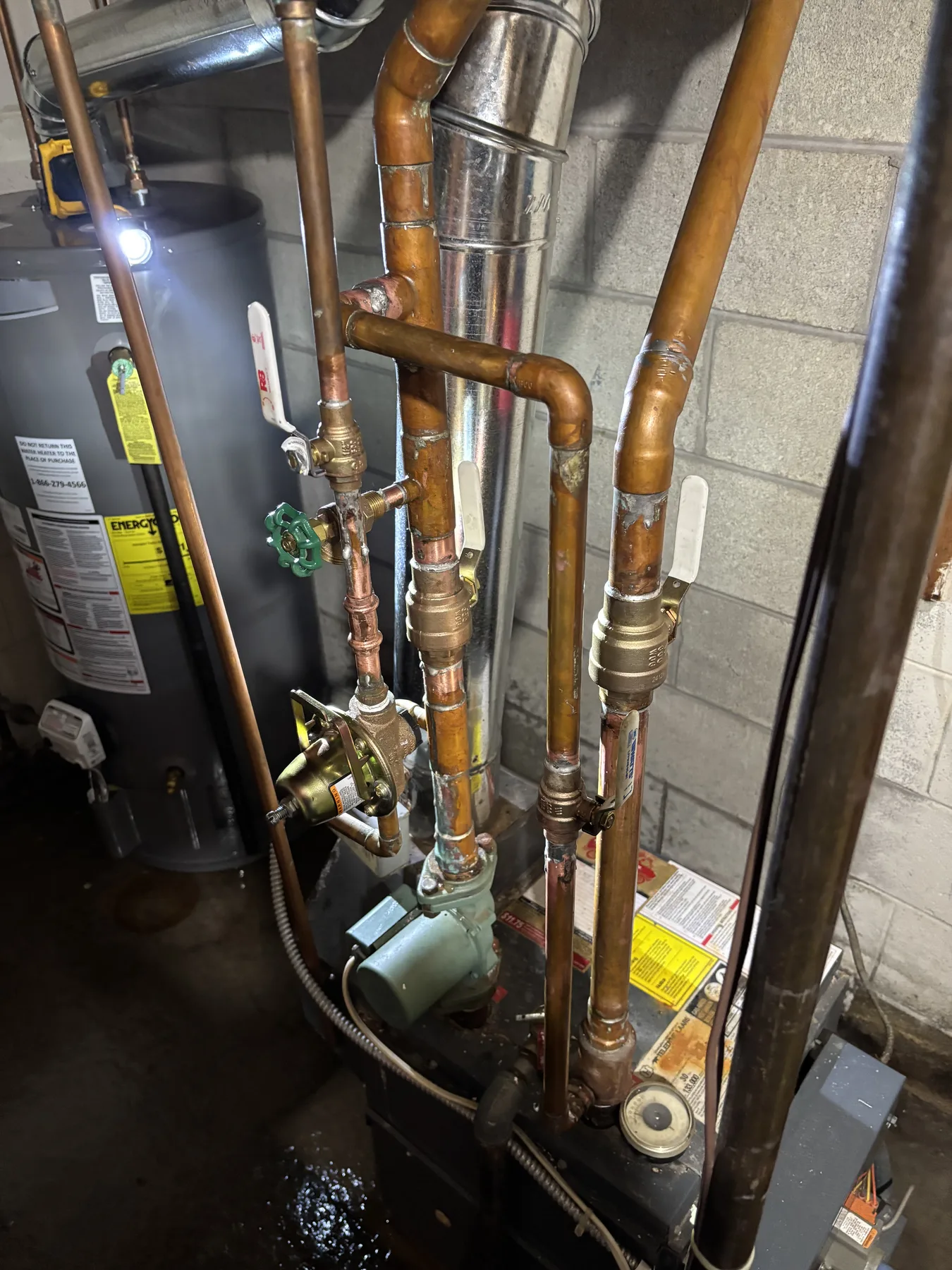 Replacement water heater and connected plumbing lines